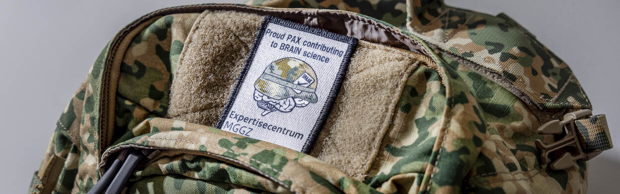 Banner SNAAK: militair met rugzak